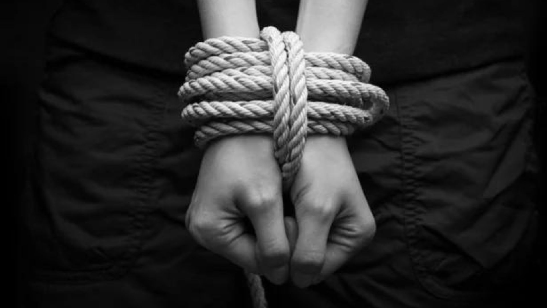hands tied with a rope