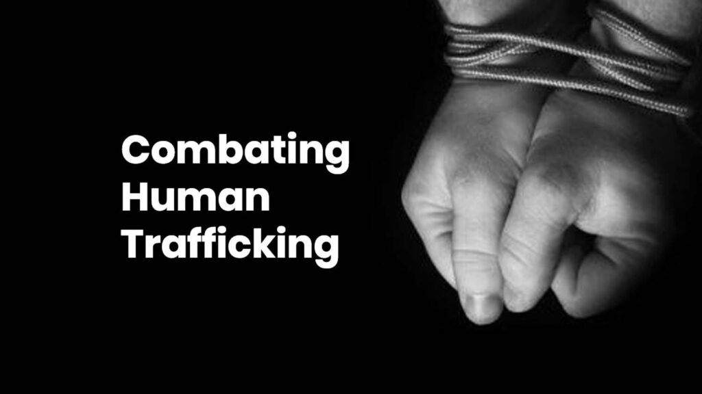 hands tied and a text wrtten combatting human trafficking