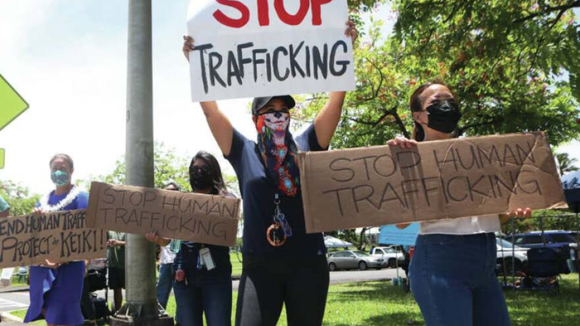 young people protesting showing youth engagement in anti-human trafficking activism